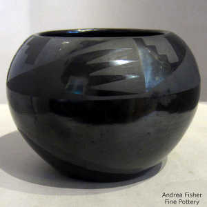 Geometric design on a black on black jar