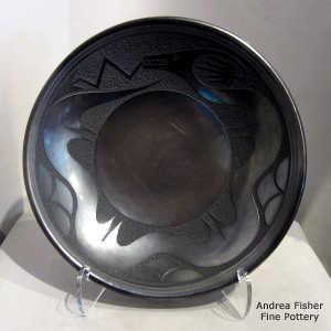 Sgraffito avanyu design on a gunmetal black plate