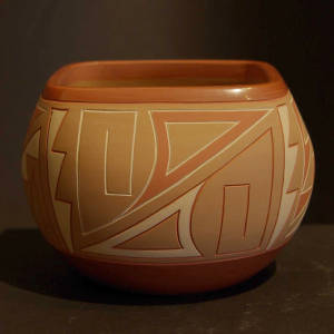 Sgraffito and painted geometric designs on a polychrome bowl