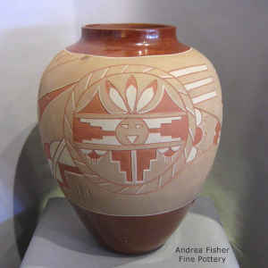 Potsuwi'i jar with sgraffito and painted sun face medallions and geometric design