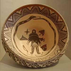 Hunter, avanayu and geometric design inside and geometric design outside on a polychrome bowl