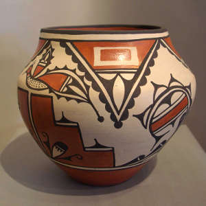 Bird and geometric design on a polychrome jar