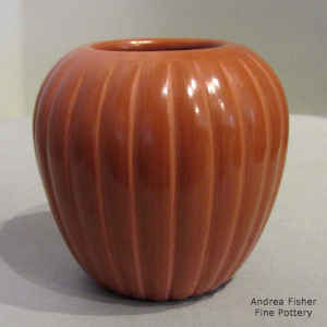 Carved red melon jar