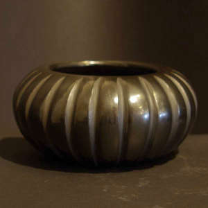Carved black melon bowl
