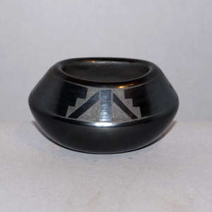 Kiva step design on a black on black jar