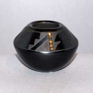 Kiva step and geometric design on a black on black jar