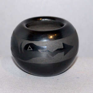 Avanyu design on a black on black jar