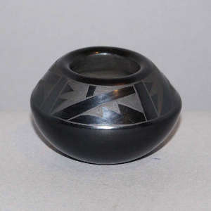 Geometric design on a black on black jar