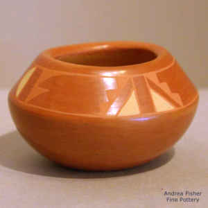 Geometric design on a miniature oval red on red jar