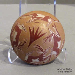 Red seed pot with a sgraffito deer and geometric design