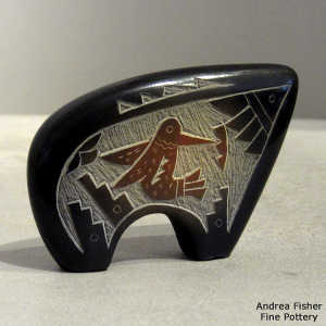 Sienna spot and sgraffito hummingbird, kiva step and geometric design on a black bear figure