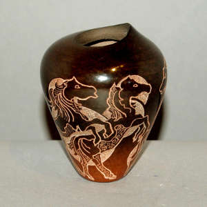 Sgraffito horse design on a brown jar with an organic opening