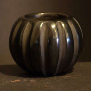 Black carved melon jar