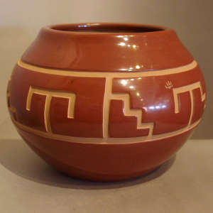 Kiva step and geometric design plus one sgraffito bear paw carved into a red jar