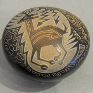 Sgraffito elk, lightning bolt and geometric design on a black seedpot with sienna spots