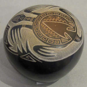 Sgraffito turtle and contemporary geometric design on a black seedpot with sienna spot
