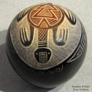 Sgraffito turtle and geometric design on a black seedpot