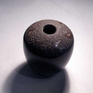 Sgraffito quail and floral motif on a black seed pot