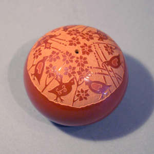 Sgraffito quail and floral design on a red seedpot