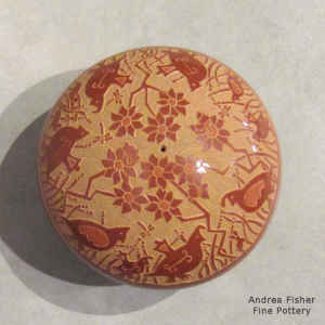 Red seed pot with a sgraffito quail, branch and flower design