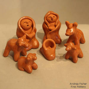 Seven pieces in a red nativity set