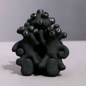 2 children on a black mudhead