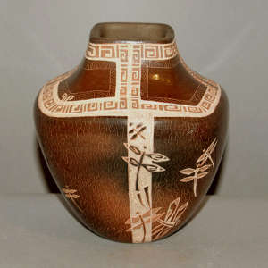 Sgraffito dragonfly and geometric design on a square brown jar