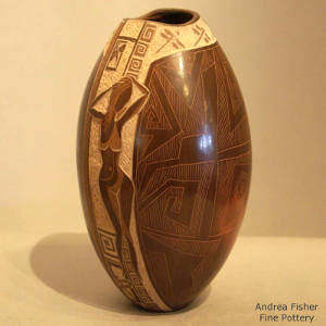Sgraffito dragonfly, female and geometric designs on a brown jar