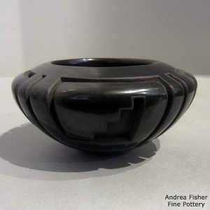 Four panel kiva step and geometric design carved into a black bowl