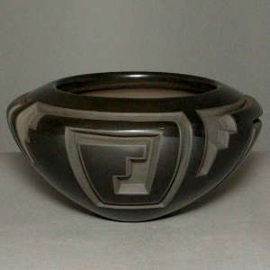 Kiva step and geometric design carved into a black bowl