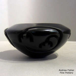 4-panel kiva step and geometric design carved into a black bowl