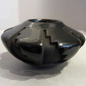 Kiva step design carved into a black bowl