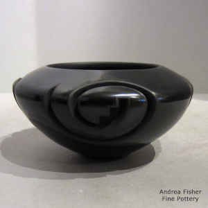 4-direction kiva step and spiral geometric design carved into a black bowl