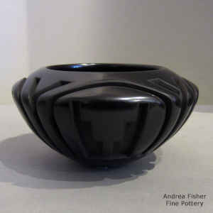 4-direction kiva step and geometric design carved into a black bowl