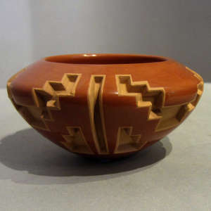 Geometric designs carved on a red bowl