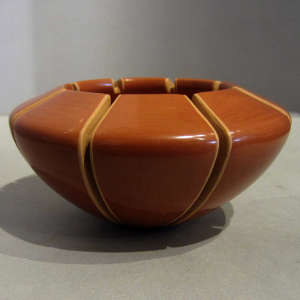 Red bowl with carved lines