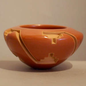 Interlocking kiva step design carved in a red bowl