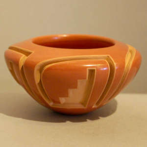 Kiva step and geometric design carved into a red bowl