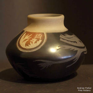Sgraffito avanyu design plus three brown panels and a grey rim on a black jar