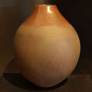 Burnished and matte surface with fire clouds on a jar