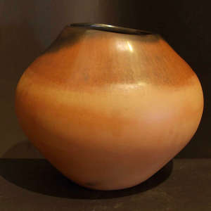 Fire clouds on a burnished and matte surface brown jar