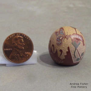 Sgraffito and painted nature design on a miniature polychrome seed pot