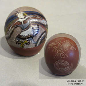Sgraffito and painted eagle dancer design on a polychrome seedpot