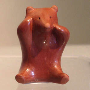 Polished red bear figure