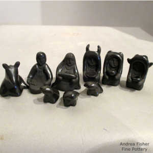 13 pieces in a black nativity set