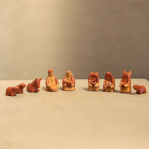 Nine pieces in a red nativity