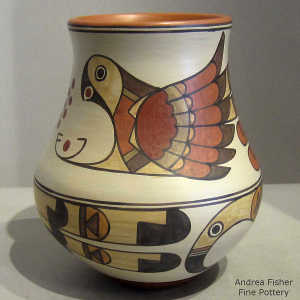 Bird and feather design on a polychrome jar