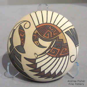 Bird element and geometric design on a polychrome seed pot