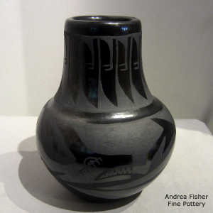 Avanyu, feather and geometric design on a black on black jar