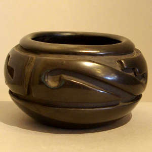 Geometric design carved into a black bowl